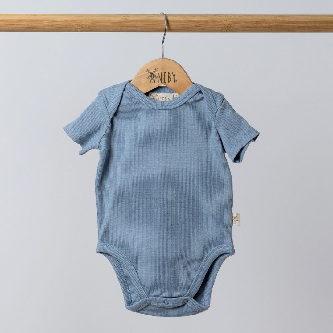 Slate blue short sleeve bodysuit with crotch poppers and envelope neck opening