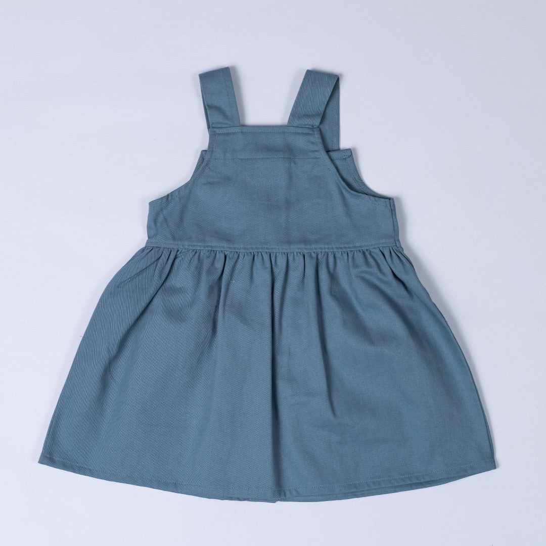 Back view of pleated dress in dusty blue