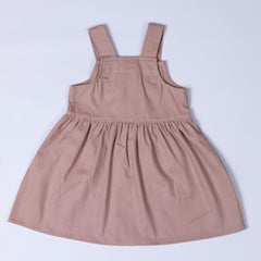 Back view of pleated dress in dusty pink