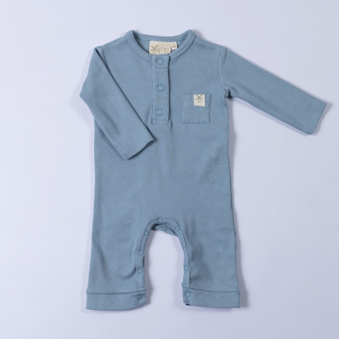 Slate blue jersey rib jumpsuit with popper crotch opening and cute chest patch pocket