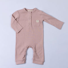 Dusty pink Aneby jumpsuit with windmill hem tag