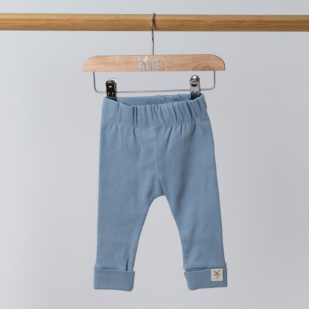 Slate blue baby leggings with rolled hem cuff and Aneby windmill logo hem tag