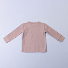 Rear image of dusty pink long sleeve top with thick neck binding and cuffs