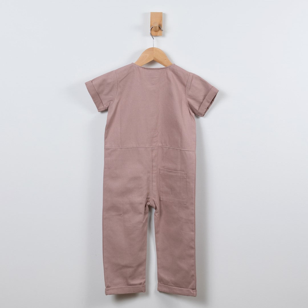 Back of dusty pink jumpsuit on wooden Aneby hanger