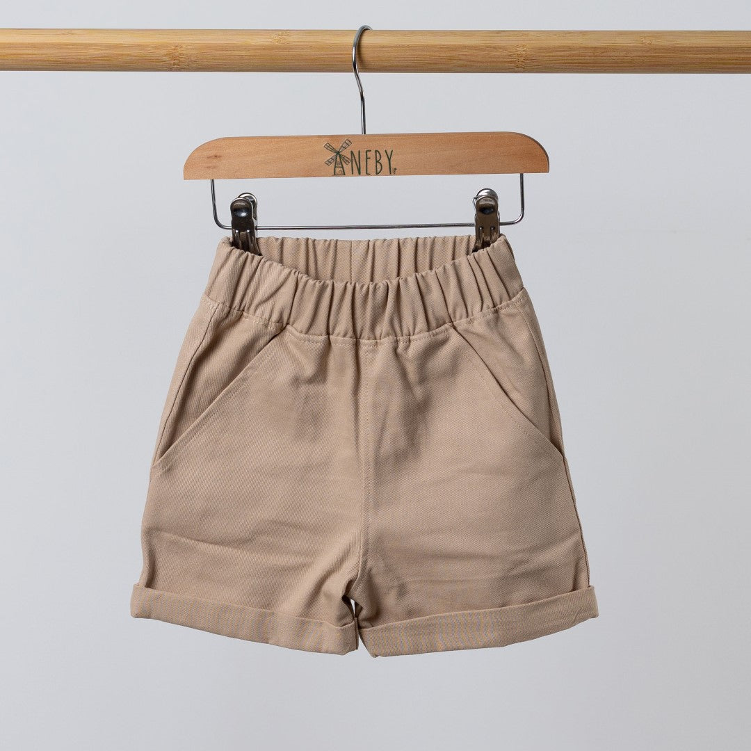 Neutral beige Aneby shorts on wooden hanger with rolled hem and elasticated waist band