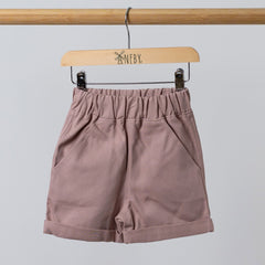 Front view of dusty pink twill shorts with elasticated waist