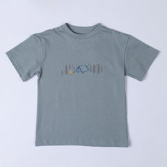 Product shot of grey-blue tee with a chic camping design that includes tepee and camp fire