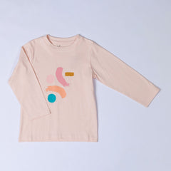 Product shot of a long-sleeved t-shirt in pink with brush stroke effects on the front