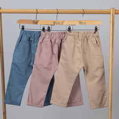 Trousers with elasticated waistband in blue, pink and beige