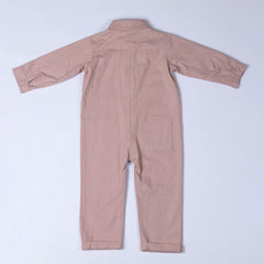 Back view of a dusty pink twill kids boilersuit, designed for everyday comfort and play.