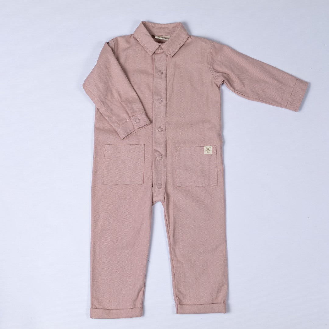 Dusty pink twill kids boilersuit, front view, featuring soft, breathable organic fabric.