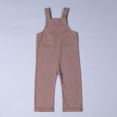 Back view of dusty pink kids' dungarees with patch pockets, designed for everyday play.