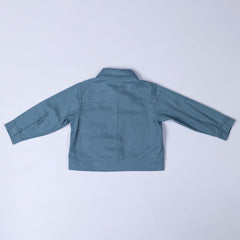 Rear view of a slate blue kids' organic cotton shacket, showing the simple, classic design with centre back seam and yoke seam.